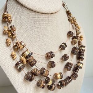 Chico’s five strands floating wood beads necklace on wire with goldtone accents